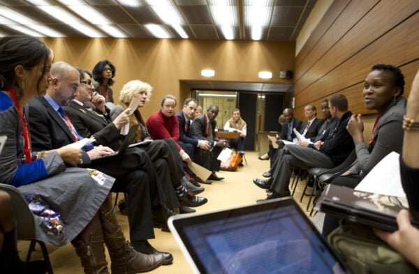 The NGO Delegation consulting with civil society observers during a PCB Meeting