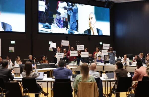 In a moment of appreciation and unity, the NGO Delegation stands in solidarity with UNAIDS Secretariat staff at the 56th PCB meeting